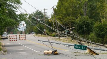 Straight line winds from a derecho storm caused downed power lines.