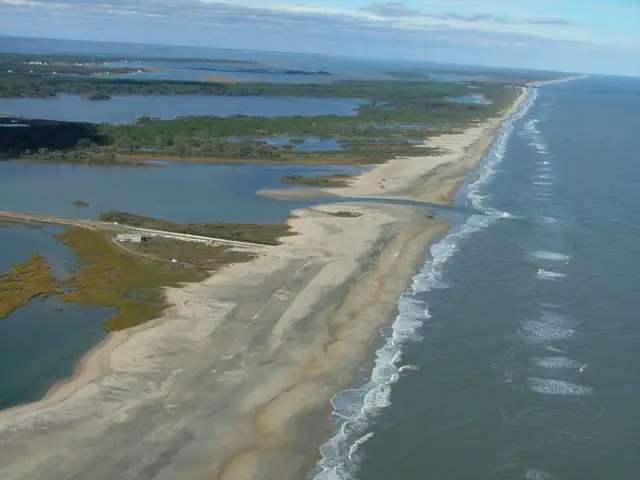 The picture shows the after effects of a storm surge along the coast. 