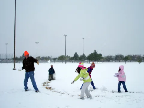 Snowball fight!... The perfect winter afternoon of family fun in the snow!