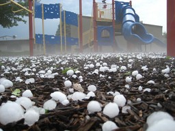 hail-stones-on-playground-by-back-garage.jpg