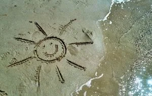 The sun drawn in the sand. 