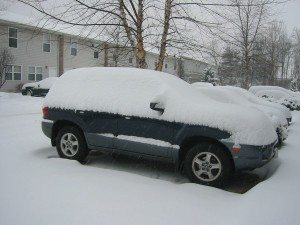 shoveling-snow-off-car