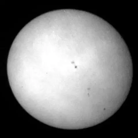 Here sun spots are seen splotching part of the lower-right area of the sun. 