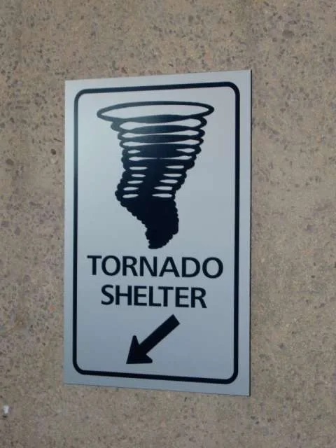 Tornado safe place sign in a public building. 